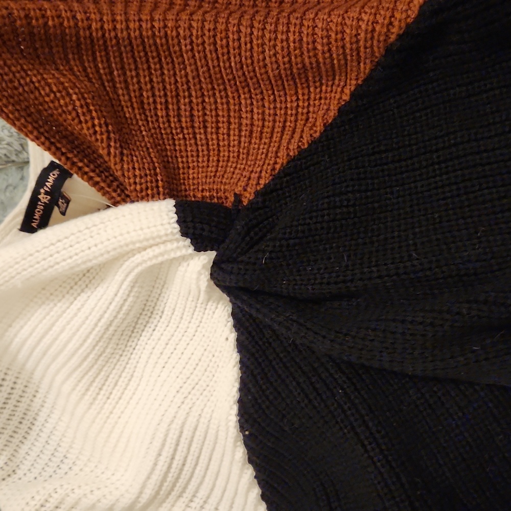Twist front color block sweater